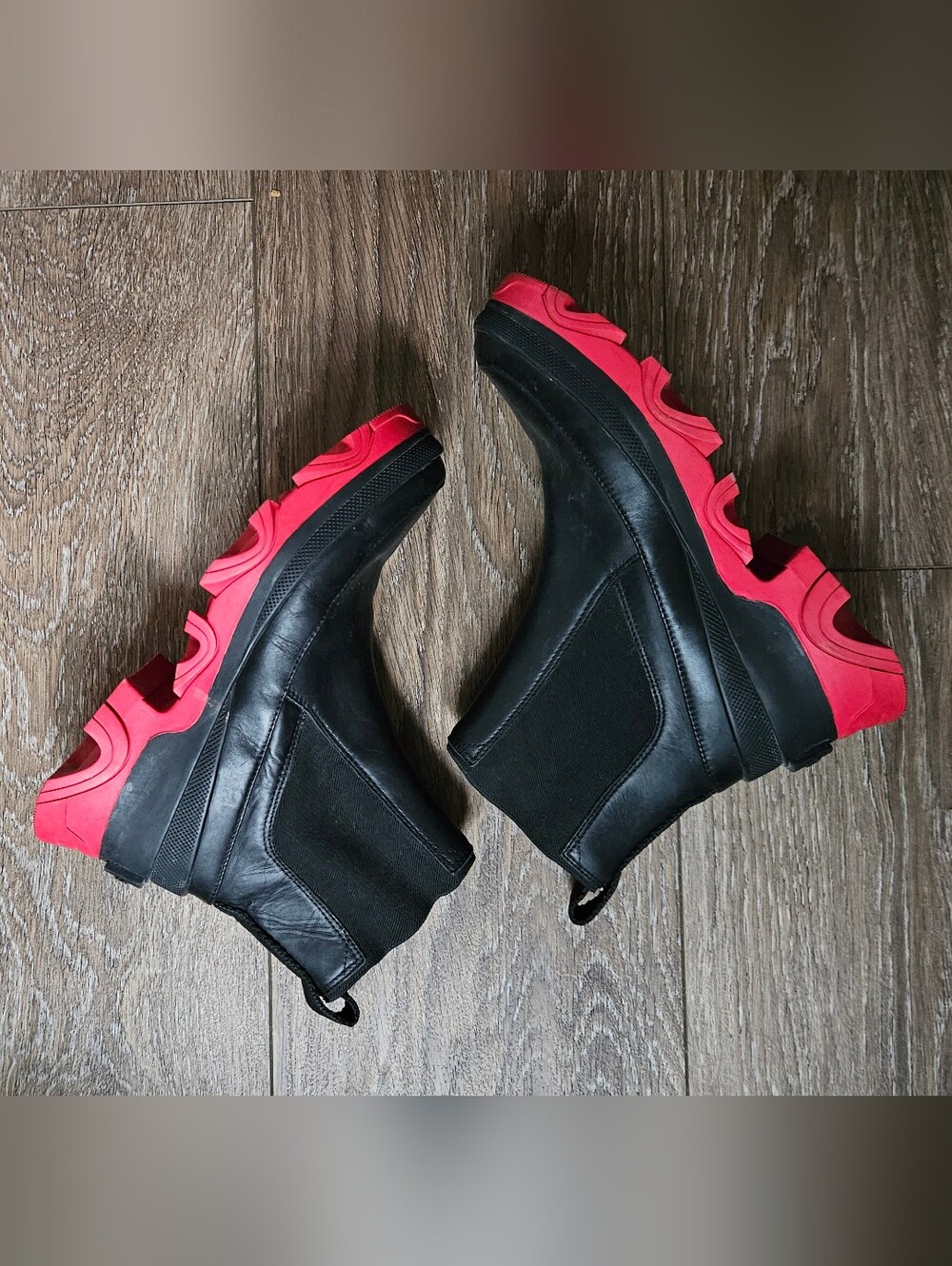 Sorel Black Leather Chelsea Boots with Red Outsole